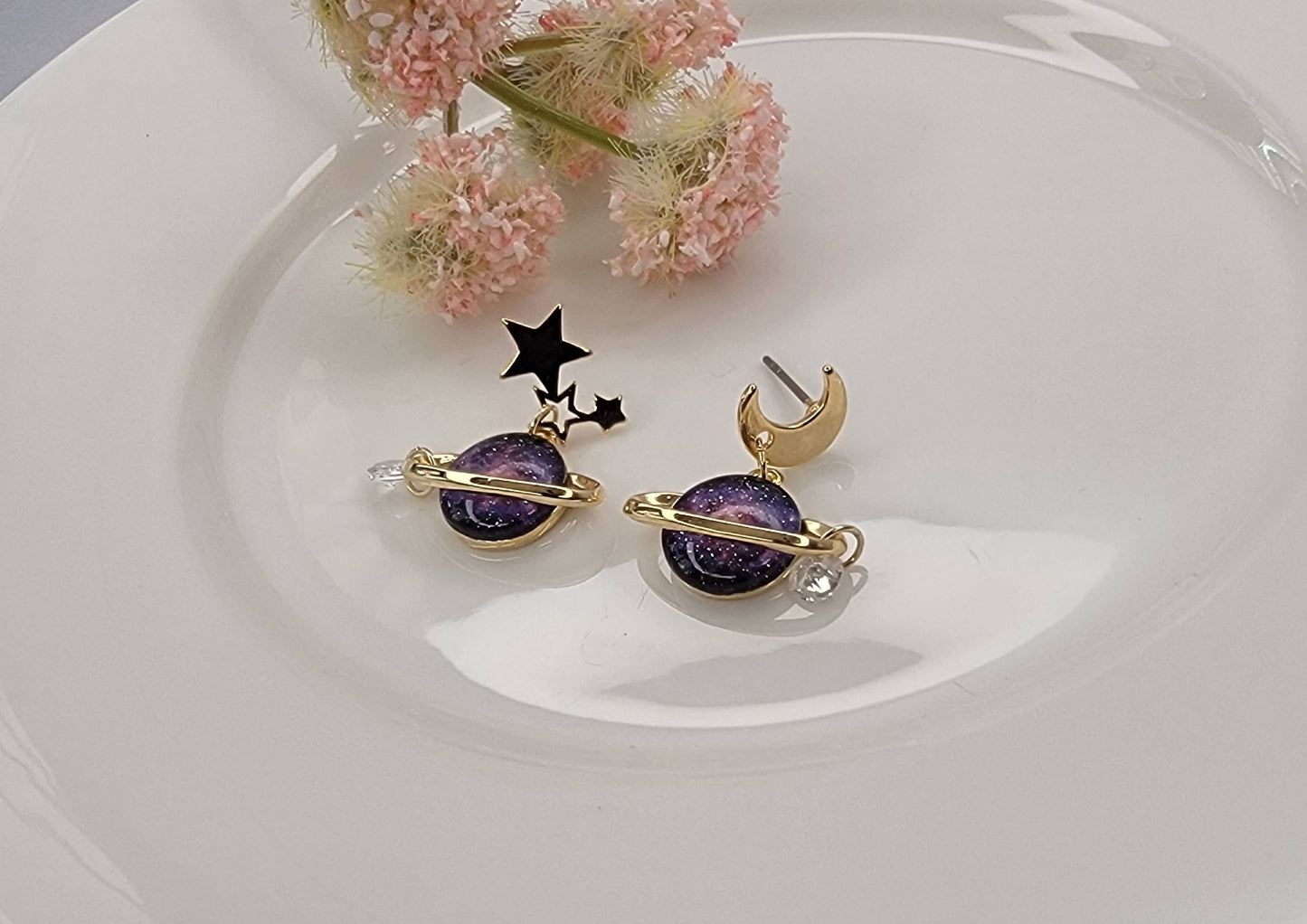 PLANET AND STAR AND MOON DANGLE EARRINGS.