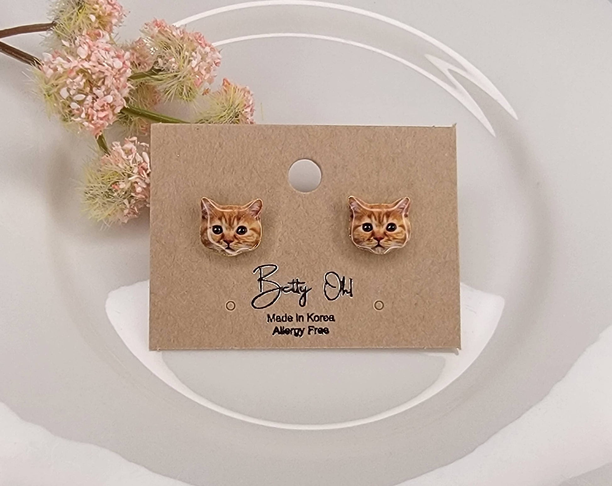 CAT POST EARRINGS.