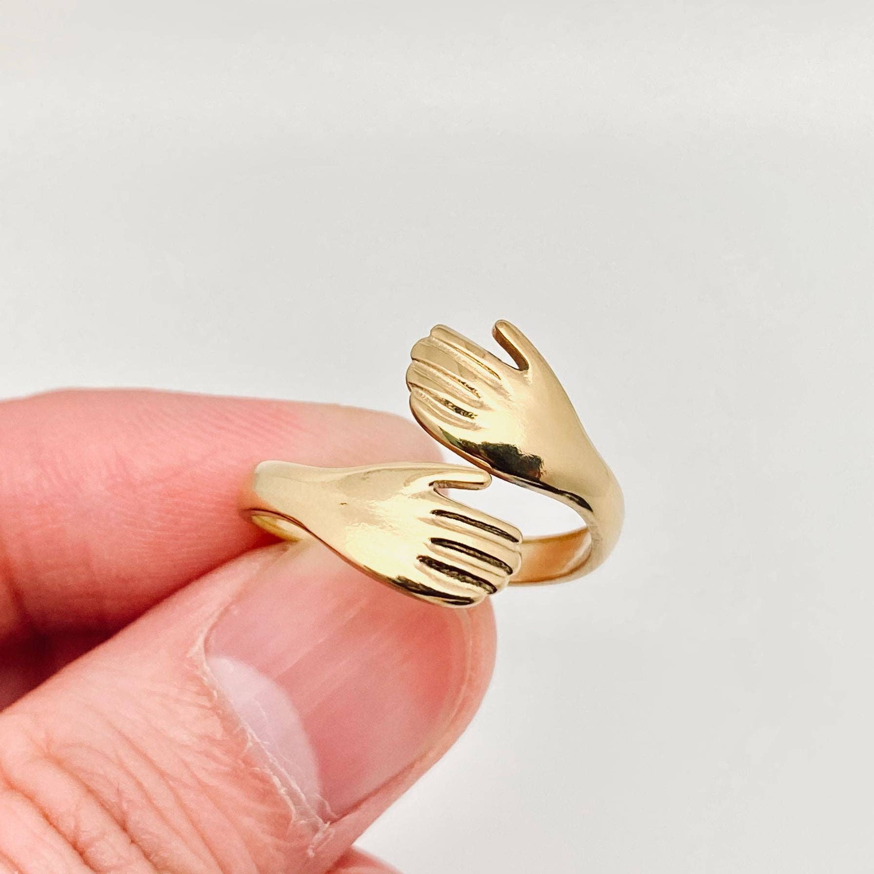 Hands Cuddling Gold Plated Stainless Steel Ring