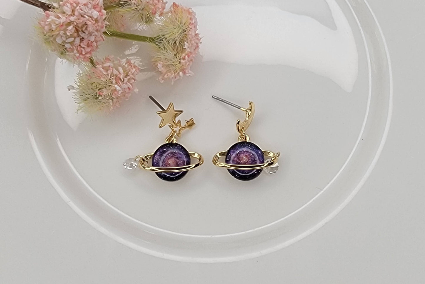 PLANET AND STAR AND MOON DANGLE EARRINGS.