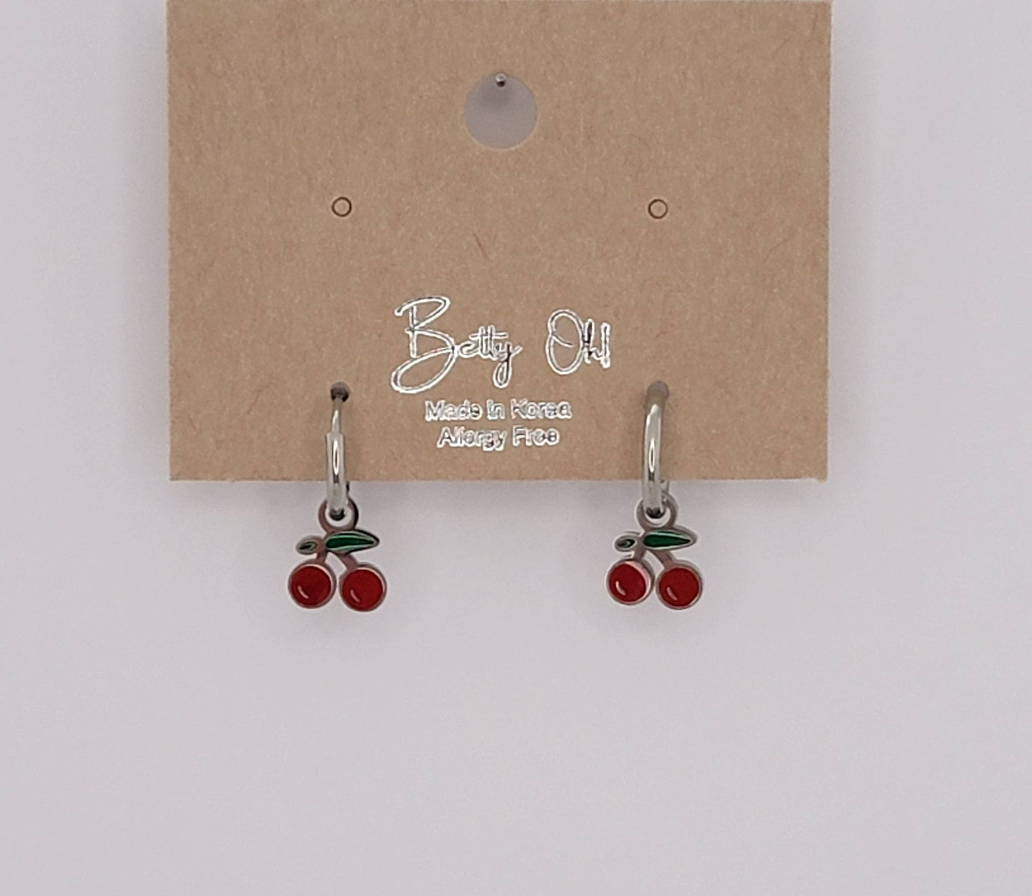 CHERRY HUGGIE HOOP WATERPROOF SS EARRINGS.