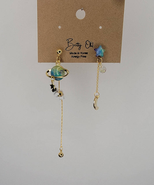 ASTRONAUT EARTH MOON AND STAR UNBALANCED DANGLE EARRINGS.