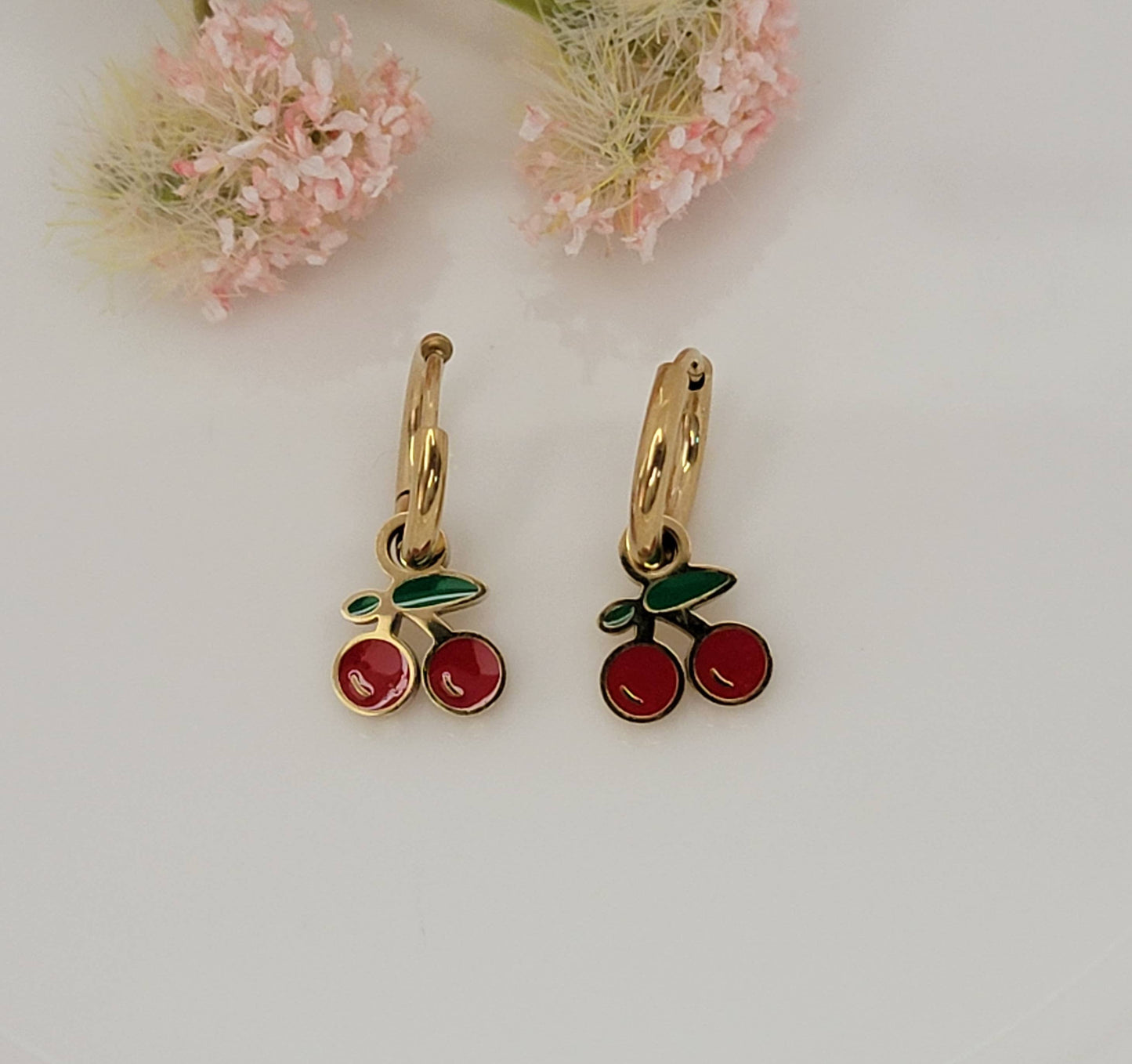 CHERRY HUGGIE HOOP WATERPROOF SS EARRINGS.